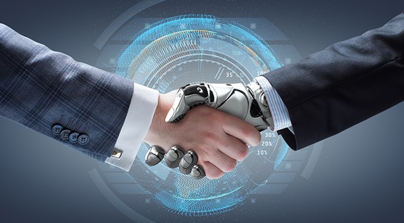 A robotic hand shakes hands with a human hand in a suit, symbolizing the partnership between technology and people that defines AI and culture in staffing.
